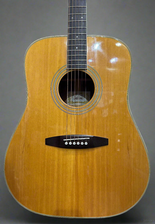 Acoustic guitar with a wooden finish on display in a store.