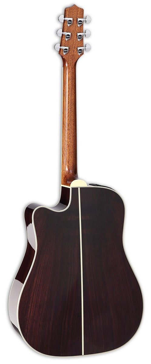 Acoustic guitar with a dark brown finish on a white background