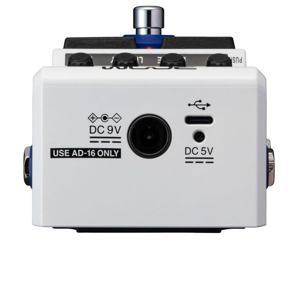 Guitar effects pedal with labeled ports and a Zoom logo on a white background