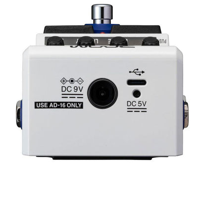 Guitar effects pedal with labeled ports and a Zoom logo on a white background