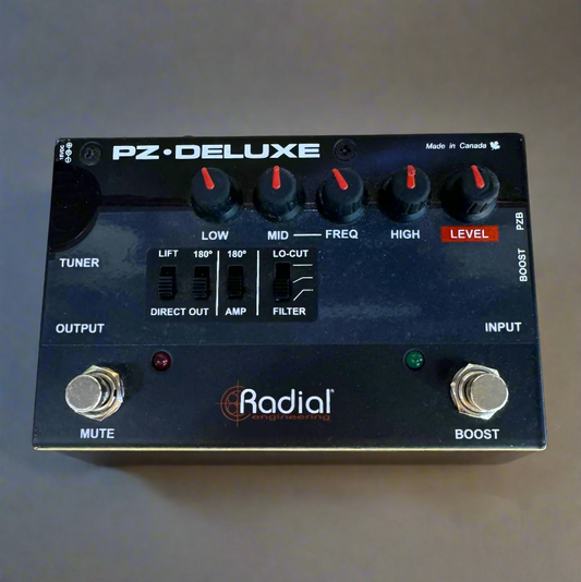 Radial PZ Deluxe guitar effects pedal on a wooden surface