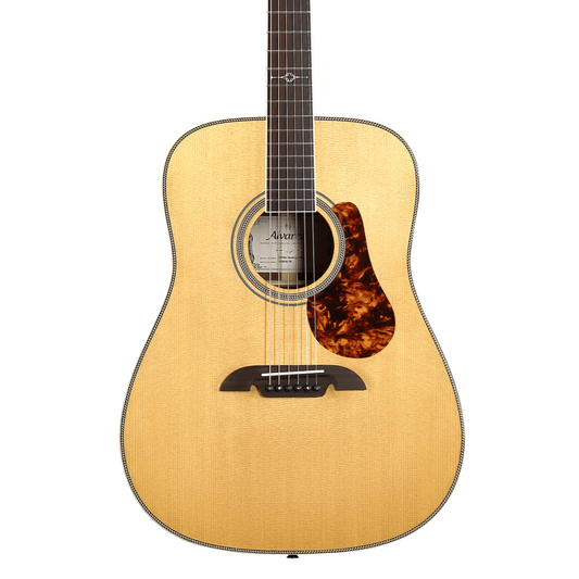Acoustic guitar with a natural wood finish on a white background