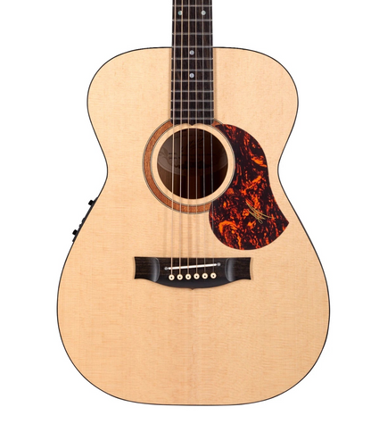 Acoustic guitar with a tortoiseshell pickguard on a white background