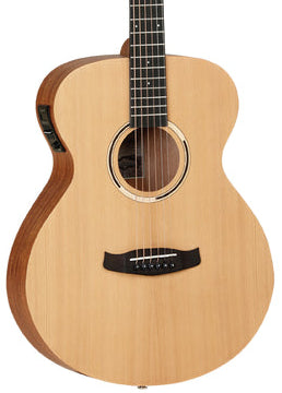 Acoustic guitar with a natural wood finish on a white background