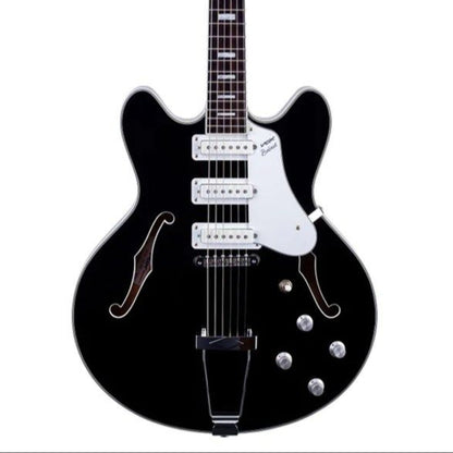 Black electric guitar on a white background