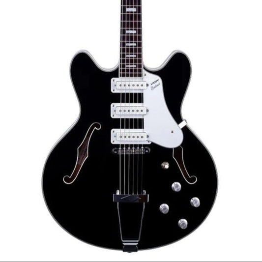 Black electric guitar on a white background